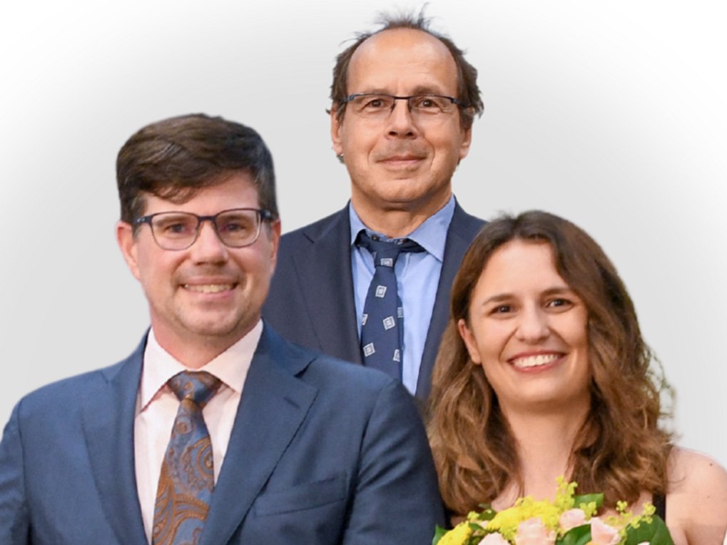 3 people in formal dress